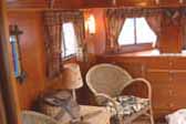 Vintage fishing creel and interior accessories in 1938 Kozy Coach Trailer